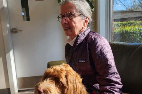 Peritoneal mesothelioma survivor Susan Dickman and her dog