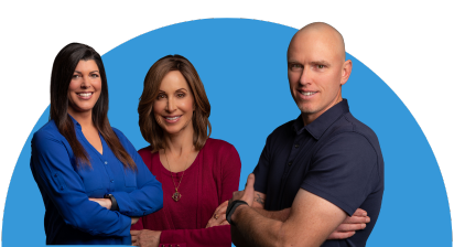 Missy, Karen, and Aaron in front of a blue circle